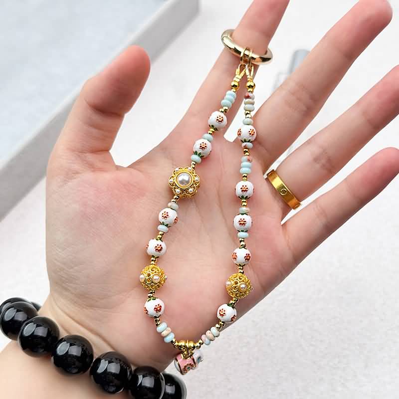 AC04302025034-5.jpg かわいい キラキラ 手首 ハンドストラップ 携帯ストラップ キラキラ キーホルダー スマホストラップ 女子 短い 可愛い スマホ スマホストラップ リストストラップ SKU:AC04302025034 - Image 1