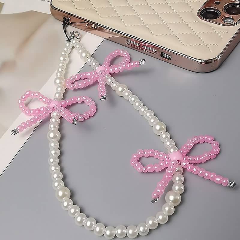AC04302025236-4.jpg パールストラップ かわいい キラキラ 手首 ハンドストラップ 携帯ストラップ キラキラ キーホルダー スマホストラップ 女子 短い 可愛い スマホ スマホストラップ リストストラップ 全4色 SKU:AC04302025236 - Image 1