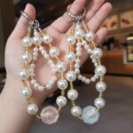 パールストラップ かわいい キラキラ 手首 ハンドストラップ 携帯ストラップ キラキラ キーホルダー スマホストラップ 女子 短い 可愛い スマホ スマホストラップ リストストラップ  全5色 SKU:AC04302025237 - Image 6