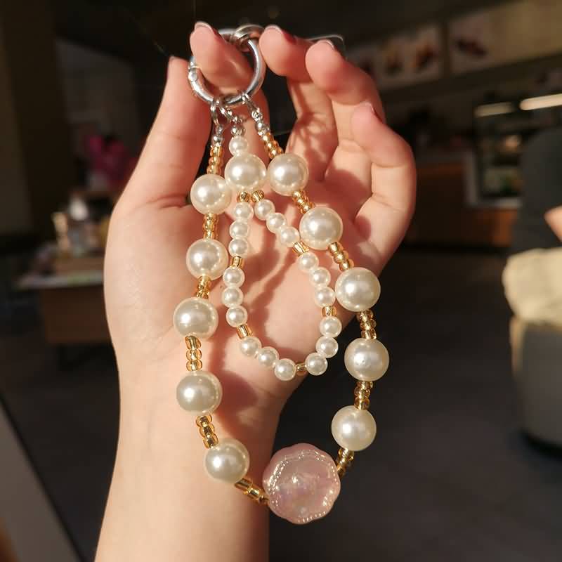 AC04302025237-8.jpg パールストラップ かわいい キラキラ 手首 ハンドストラップ 携帯ストラップ キラキラ キーホルダー スマホストラップ 女子 短い 可愛い スマホ スマホストラップ リストストラップ 全5色 SKU:AC04302025237 - Image 1